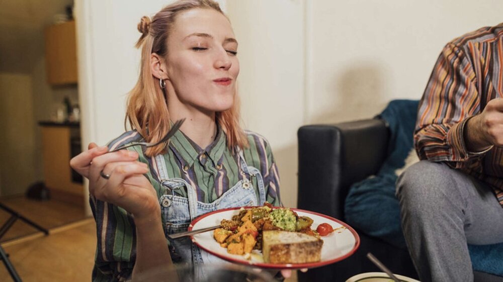 womanEatingTofu.jpeg
